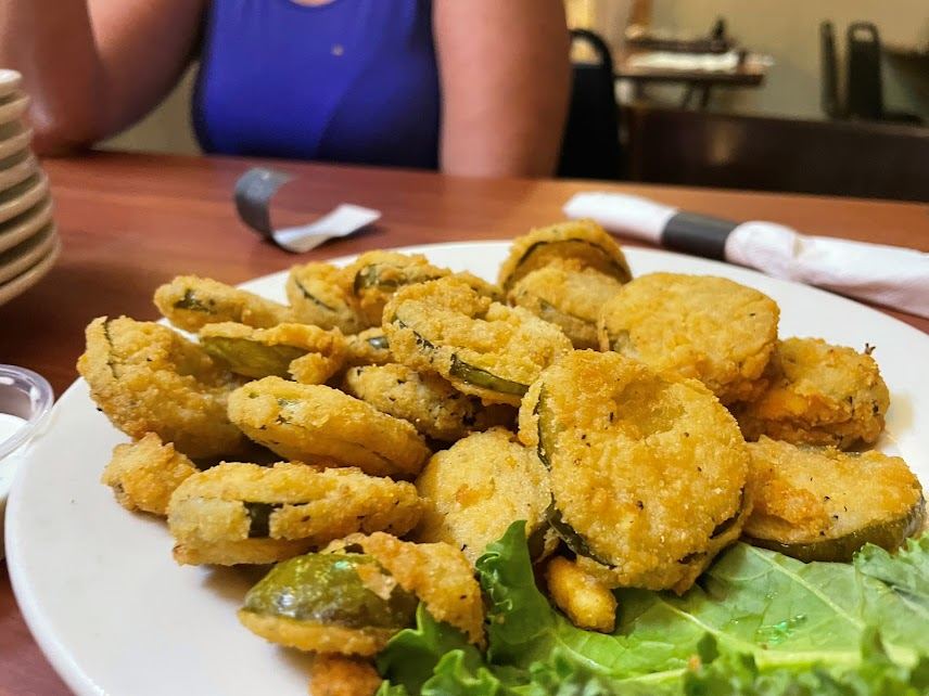 Basket of fried dill pickles at The Point Restaurant Perdido