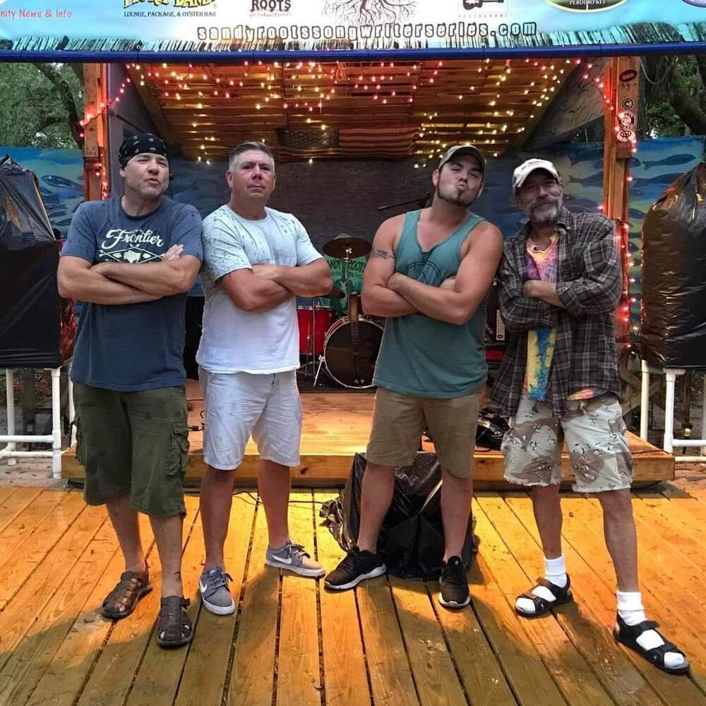 Band lined up on the Courtyard stage at The Point Restaurant Perdido